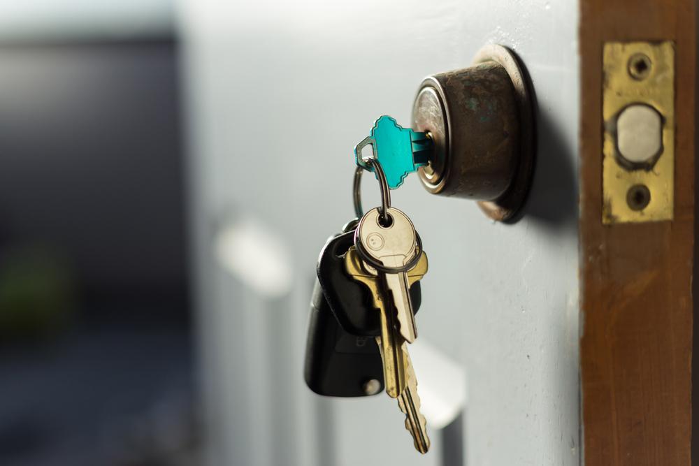 Keys in door - shutterstock