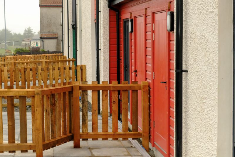 External view of north side of house showing fence