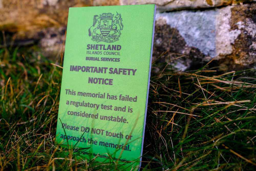 Unsafe memorial sign